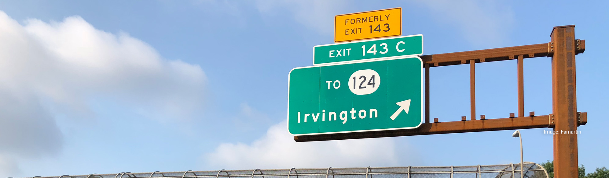 Road sign pointing in direction of Irvington, New Jersey